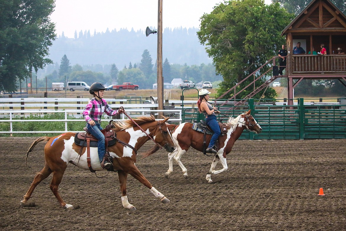 Photo by MANDI BATEMAN
Two pintos race head to head during Family Fun Night.