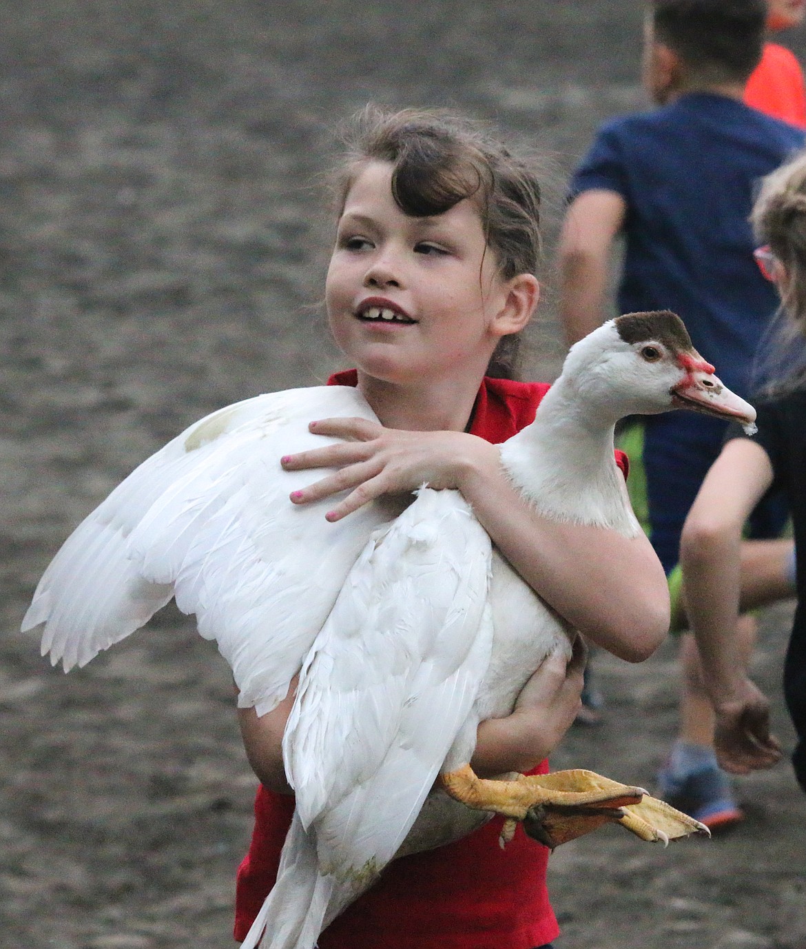 Photo by MANDI BATEMAN
A girl and her hard won duck.