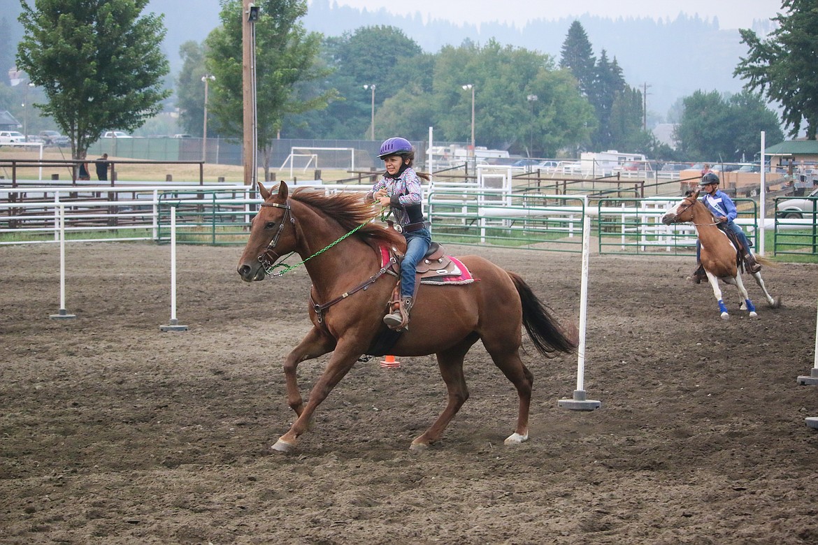 Photo by MANDI BATEMAN
Evellyhn Stuber and Riley Petesch compete in the Keyhole Race.