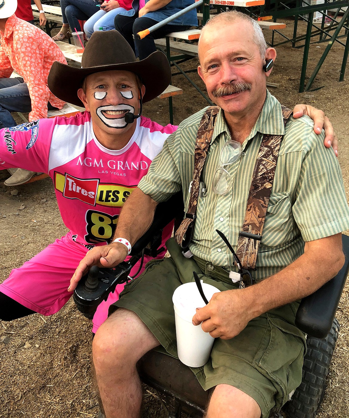 Rodney Harwood/Columbia Basin HeraldRodeo clown JJ Harrison joins Wade Leslie of George. Leslie is the only man in rodeo history to post a 100-point bull ride.