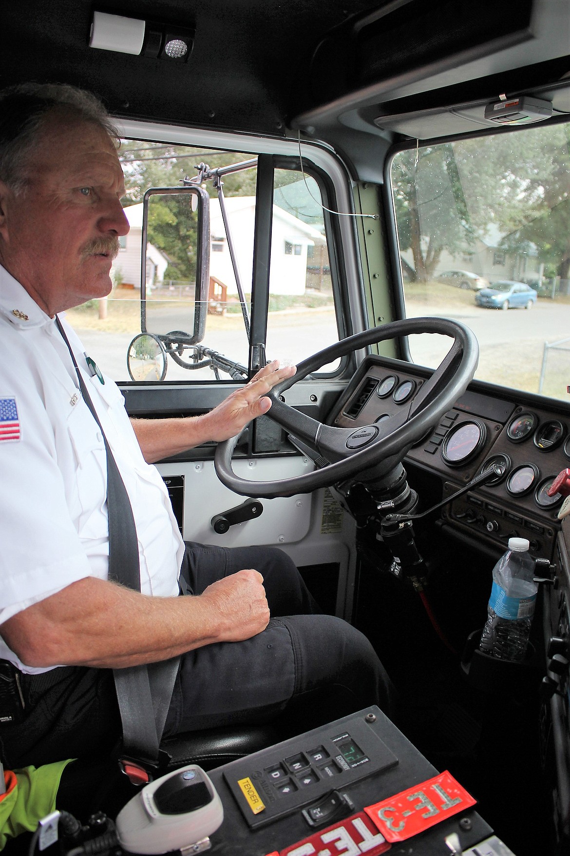 Superior Fire Chief Steve Temple drives the department&#146;s water tender, provided by DNRC. It is equipped with an automatic transmission which makes it easier to operate.