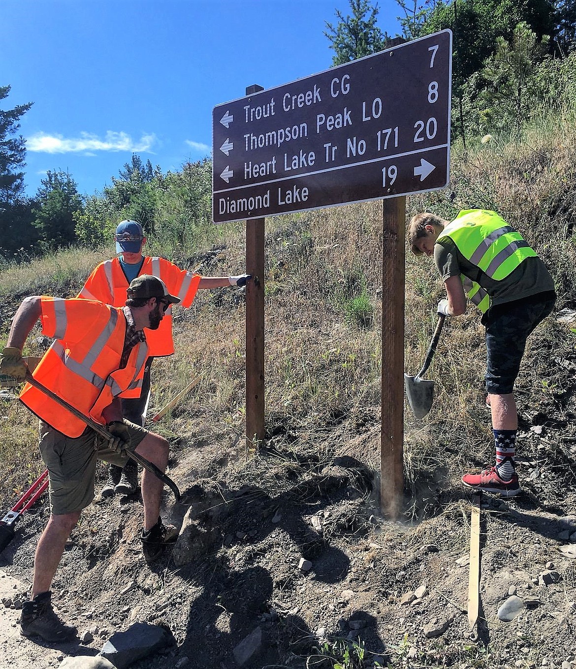 Boy Scouts and members from a local church group helped Neil Mondava install signs for the Superior Forest Service District. The project was part of Mondava&#146;s work to become an Eagle Scout. (Photo courtesy of Neil Mondava)