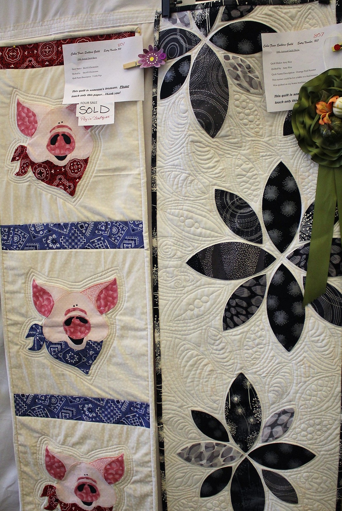 Amy Rice won best Misc/Novelty at the Cabin Fever Quilt Show for her white runner with large black flowers.