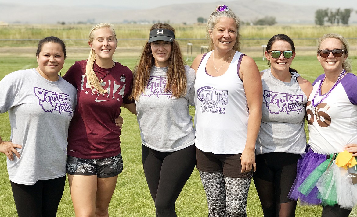 THE CHARLO High School mothers that attended the Gutz and Glitter football tutorial poses for a football Saturday morning at Charlo High School. The mothers (from left): Natalie Hawk, Mikaylan Roylance, Sara Smith, Stephanie Smith, Lindsey Dwelle and Jamie Tomlin. (photo courtesy of Mike Krahn)