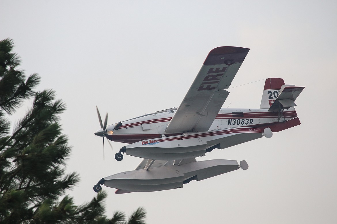 Photo by MANDI BATEMAN
Multiple firefighting planes took to the air to fight the wildfire.