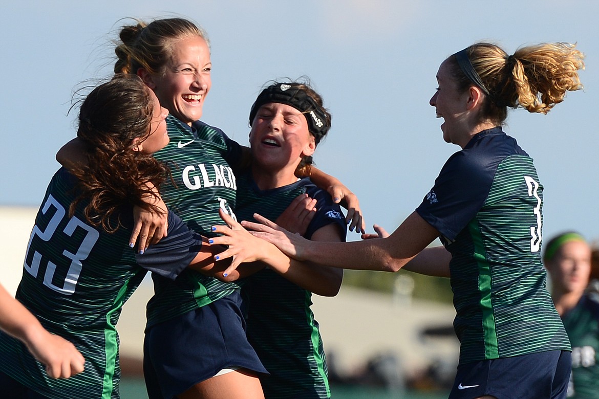 Glacier's Madison Becker celebrates with teammates after scoring a goal against Flathead during a crosstown matchup at Legends Stadium on Thursday. (Casey Kreider/Daily Inter Lake)