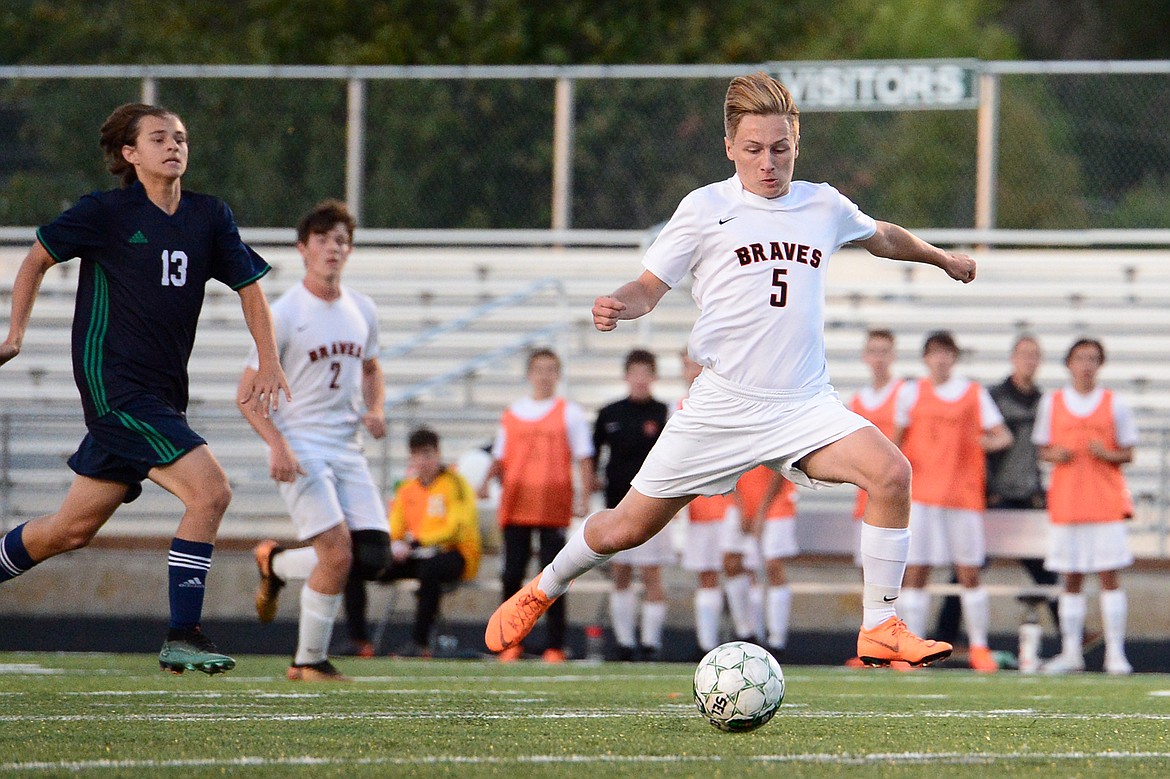 Flathead's AJ Apple scores a first-half goal against Glacier during a crosstown matchup at Legends Stadium on Thursday. (Casey Kreider/Daily Inter Lake)