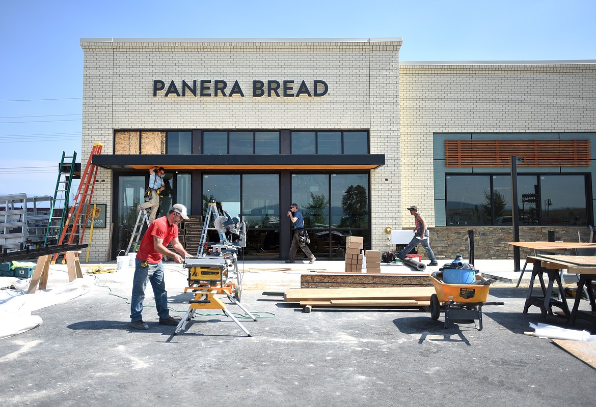Construction crews work at Panera Bread on Aug. 29.