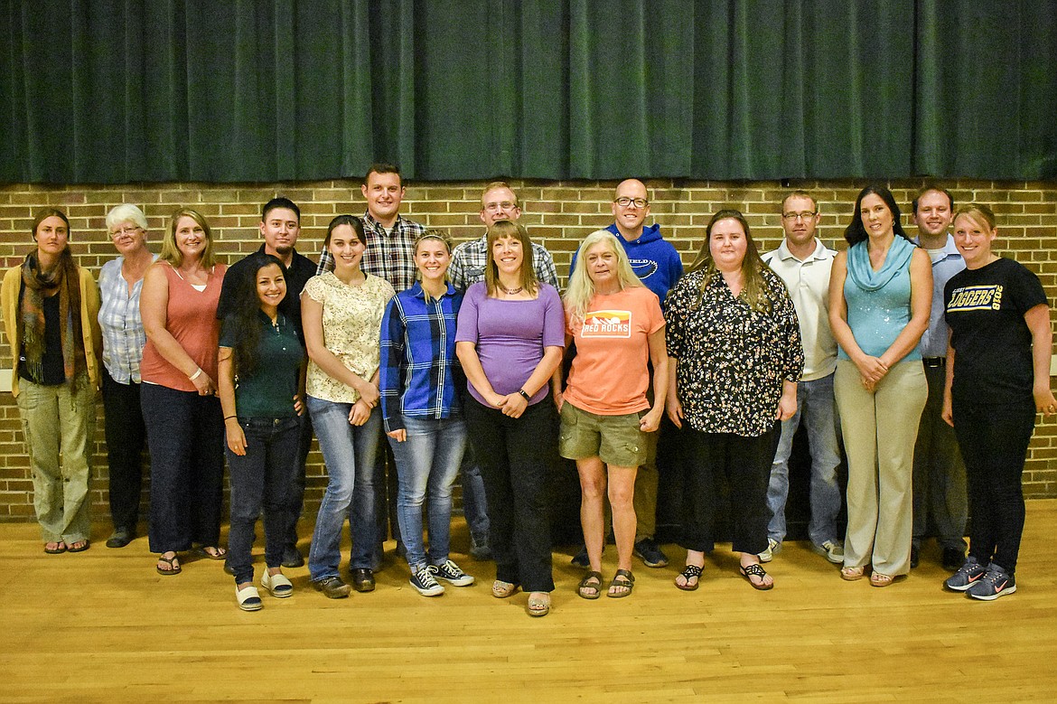 New teachers and staff at Libby Public Schools this year are, from left, Back row: Natalie Lester (elementary paraprofessional), Lois Ekstedt (elementary paraprofessional), Jennifer Canary (preschool special education), Joe Flores (elementary paraprofessional), Matthew Krantz (music/band), Brian Bennion (middle-high school English), John Braumbaugh (middle-high school social studies), Scott Marshall (sixth grade), Andrew Stiger (elementary assistant principal); front row: Clara Brewer (elementary Paraprofessional), Christine Witham (1st grade), Jayden Bennion (elementary paraprofessional), Hannah James (preschool paraprofessional), Rebekah Barbour (middle-high school special education), Crystal Combs (kindergarten), Emily Marshall (kindergarten) and Marlee Stiger (middle school English/science). Not pictured: Taylor Balkan (high school math), Alma Cano(elementary paraprofessional), Stacey Oedewaldt (elementary paraprofessional). (Ben Kibbey/The Western News)