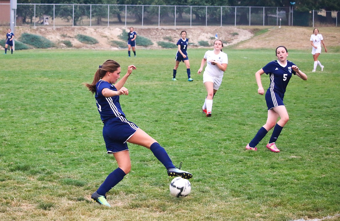 Photo by MANDI BATEMAN
Makayla Mierke with Morgan Swanson looking on.