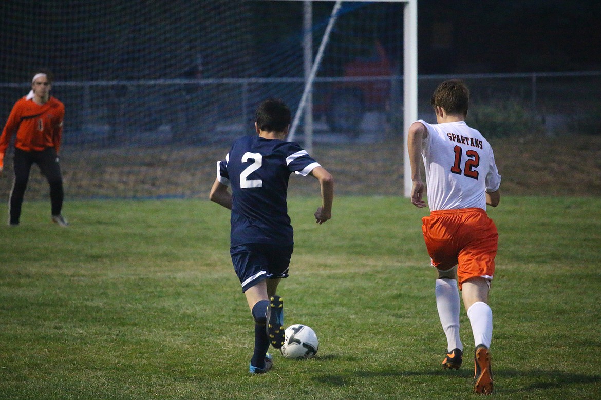 Photo by MANDI BATEMAN
Diego Jimenez makes an offensive run towards the opponents goal.