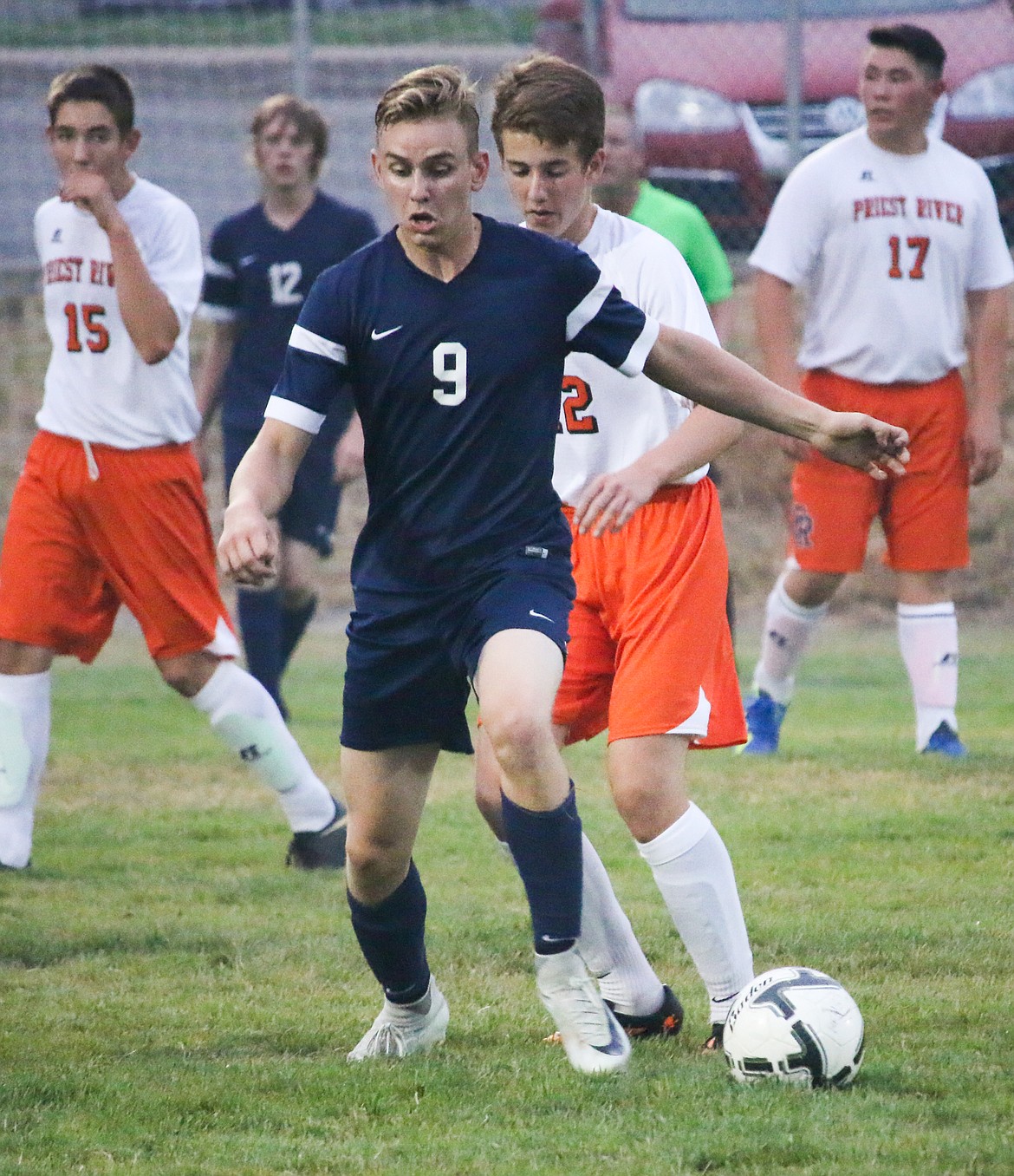 Photo by MANDI BATEMAN
Ben Tompkins attempting maintain possession of the ball again Priest River.