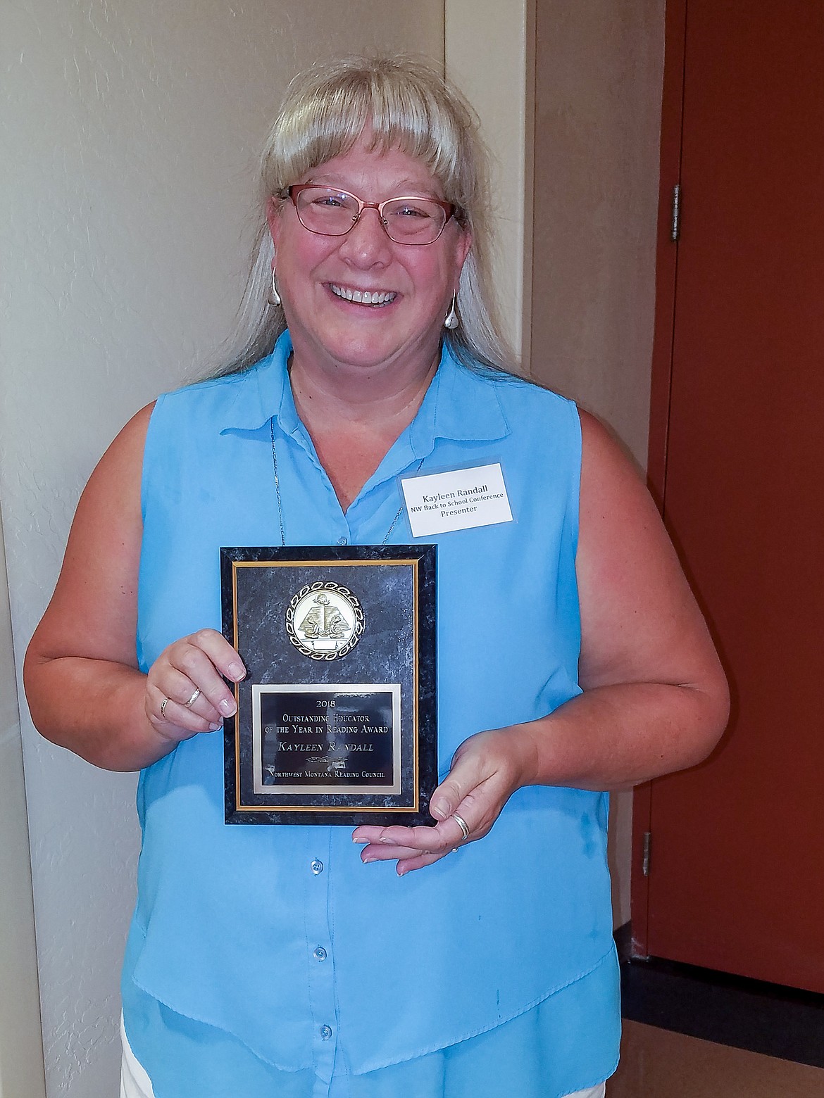 Troy Public Schools Librarian Kay Randall poses with her “Outstanding Educator of the Year in Reading” award from the Northwest Montana Reading Council on Aug. 15. (Courtesy photo)