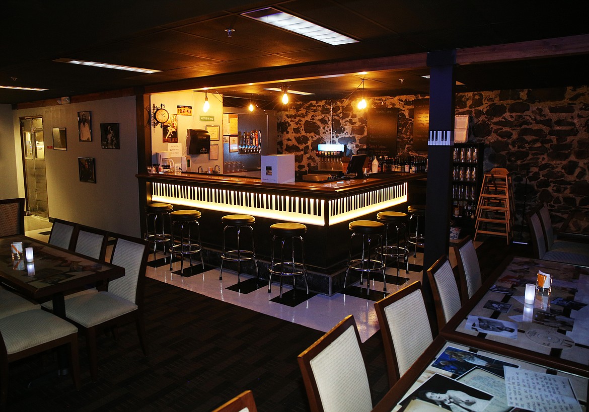 NYC Piano Bar owners Dan and Nika Schnatter will be welcoming the community to participate in a special 9/11 ceremony Tuesday to honor the police and firefighters who served that fateful day. The bar is located at 313 E. Sherman Ave. in Coeur d&#146;Alene. The lower level, pictured here, has a classic NYC piano decor. (LOREN BENOIT/Press)