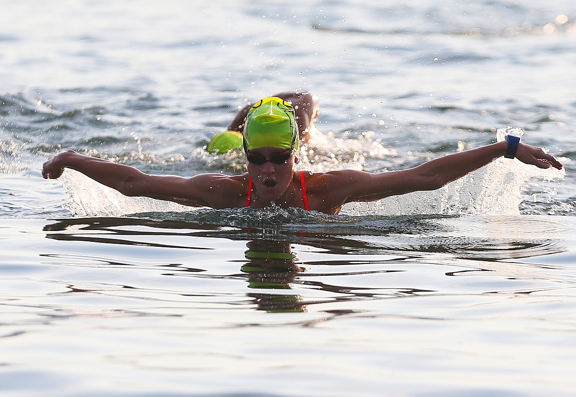 LOREN BENOIT/Press
Jenna Rings swims to Independence Point Wednesday afternoon with a group of local swimmers to show support for Coeur d&#146;Alene&#146;s bid for the USA Triathlon. Coeur d&#146;Alene is among three finalists to host the national championships during August in 2020 and 2021.