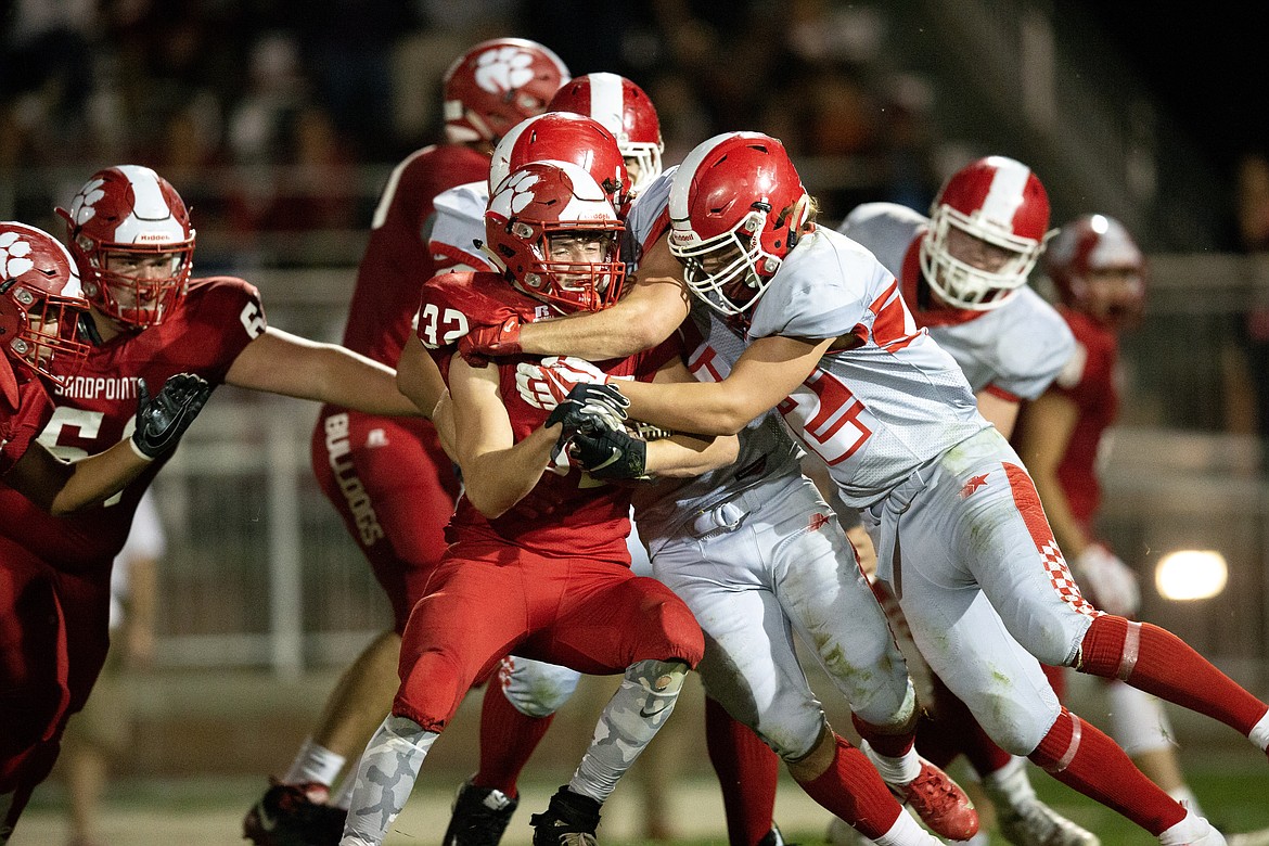 (Photo by JASON DUCHOW PHOTOGRAPHY)
Sandpoint senior running back Dillan Mitton carried the ball 29 times on Friday night, scoring two touchdowns in the process.