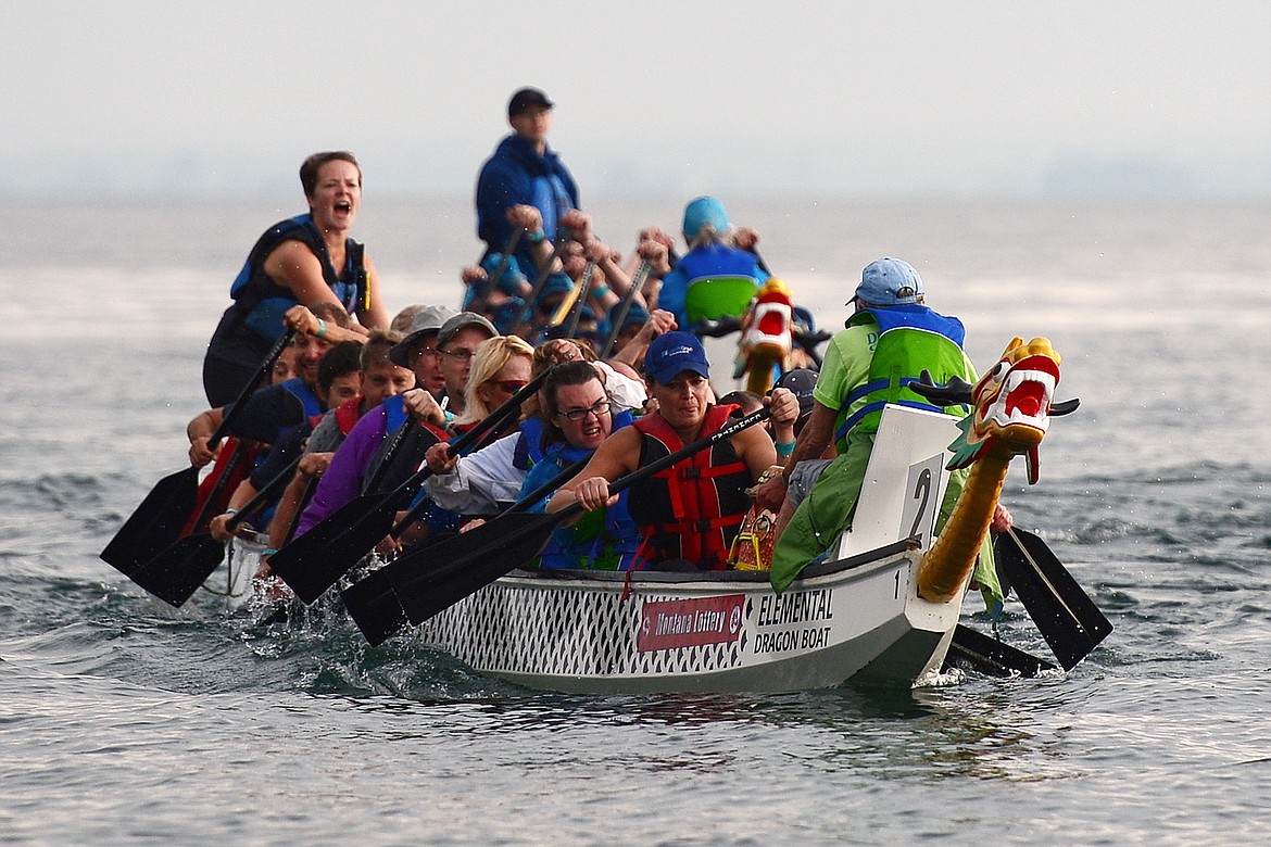 The Pearly Whites, from Kalispell, head back to shore after their race during the Dragon Boat Festival at Volunteer Park in Lakeside on Saturday. (Casey Kreider/Daily Inter Lake)