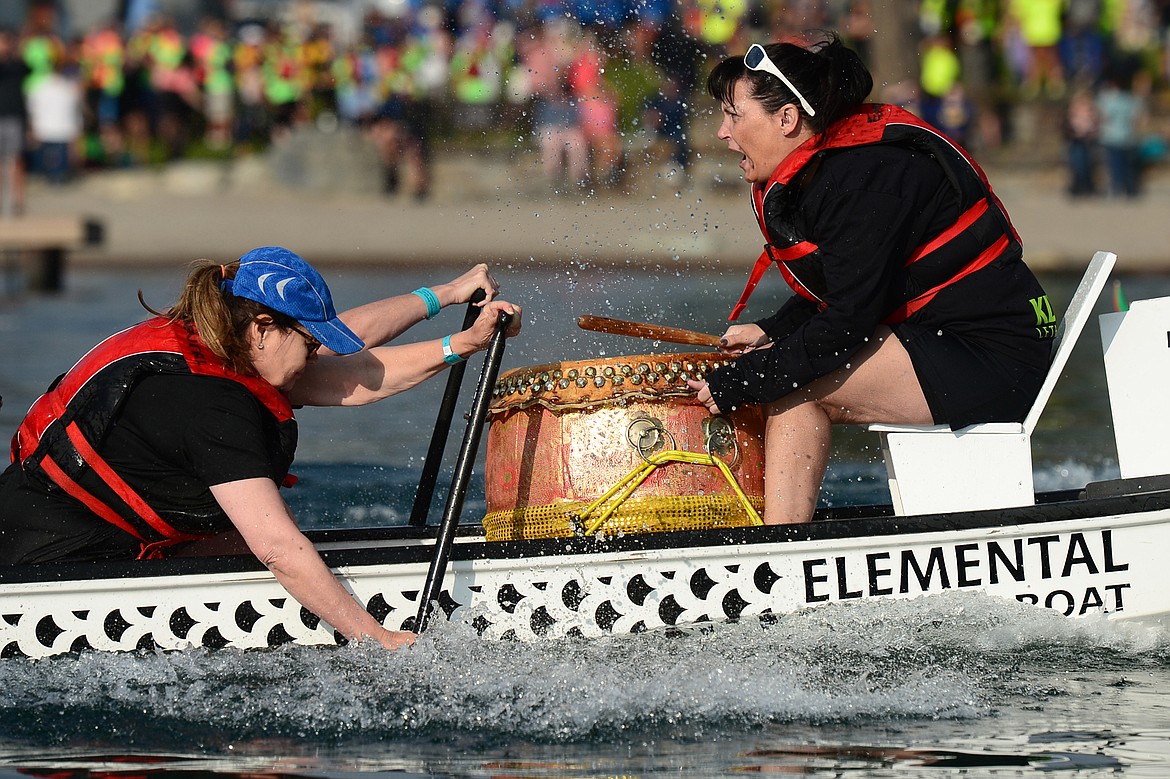 Drummer Nichole Cobey motivates the Klippers, from Lethbridge, Alberta, Canada, during the Dragon Boat Festival at Volunteer Park in Lakeside on Saturday. (Casey Kreider/Daily Inter Lake)