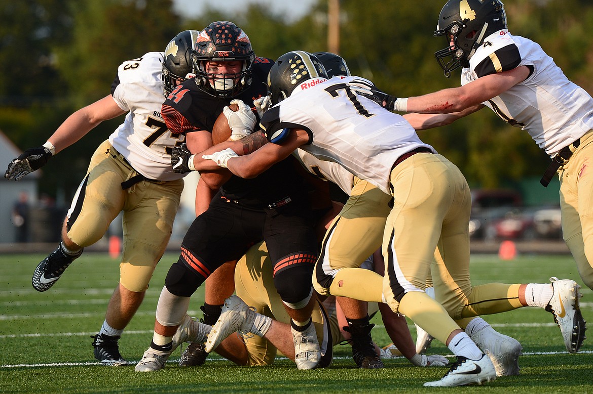 Flathead running back Blake Counts works for extra yardage on a third down in the fourth quarter against Billings West at Legends Stadium on Friday. (Casey Kreider/Daily Inter Lake)