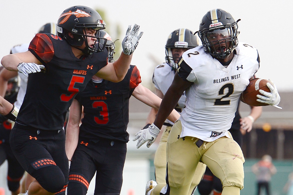 Billings West running back Demarcus Carr breaks free for a long run against Flathead at Legends Stadium on Friday. (Casey Kreider/Daily Inter Lake)