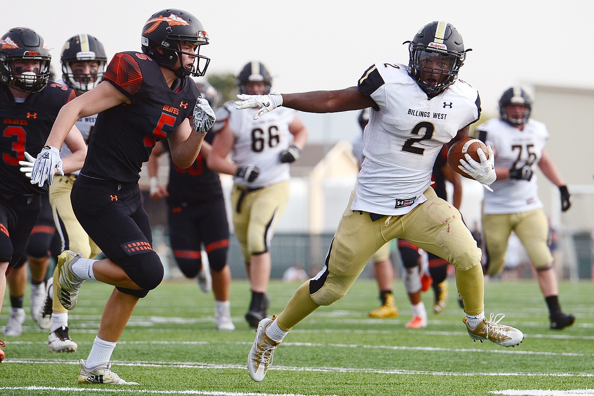 Billings West running back Demarcus Carr breaks free for a long run against Flathead at Legends Stadium on Friday. (Casey Kreider/Daily Inter Lake)