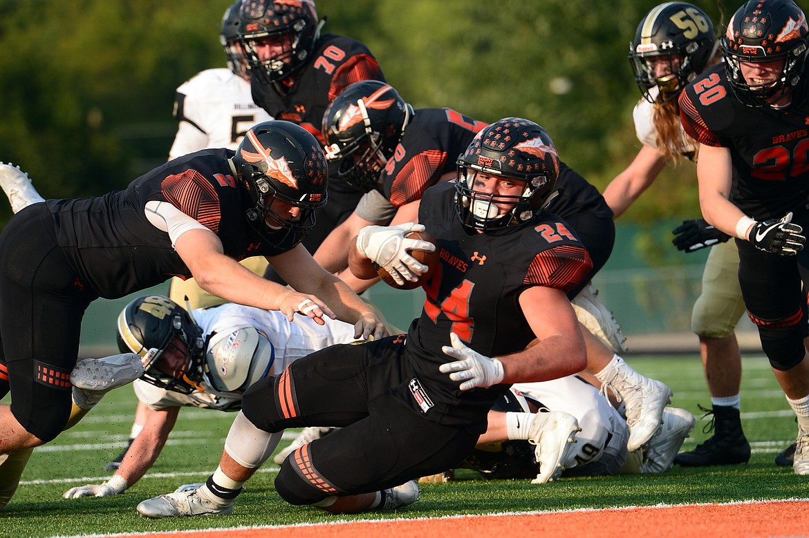 Flathead running back Blake Counts (24) scores a fourth-quarter touchdown against Billings West at Legends Stadium on Friday. (Casey Kreider/Daily Inter Lake)