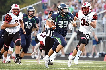 Glacier's Preston Blain breaks free on a 41-yard touchdown run in the first quarter against Bozeman at Legends Stadium on Friday. (Casey Kreider/Daily Inter Lake)