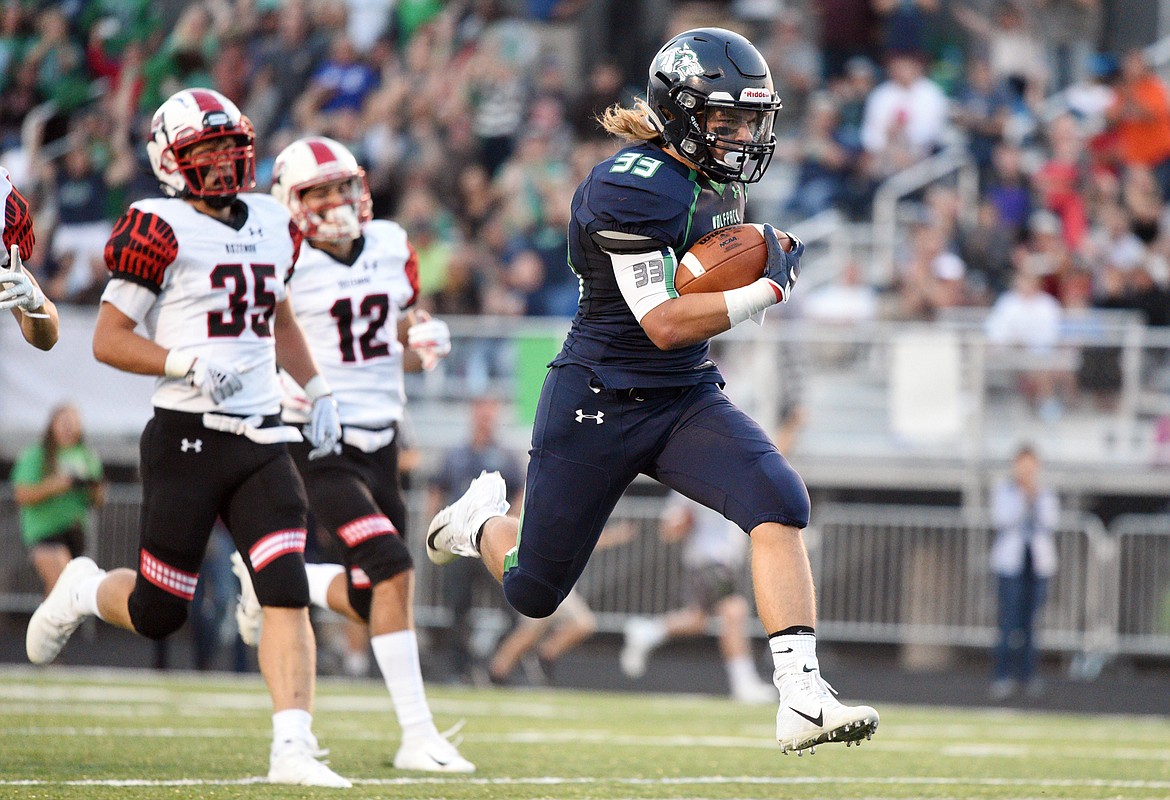 Glacier's Preston Blain breaks free on a 41-yard touchdown run in the first quarter against Bozeman at Legends Stadium on Friday. (Casey Kreider/Daily Inter Lake)