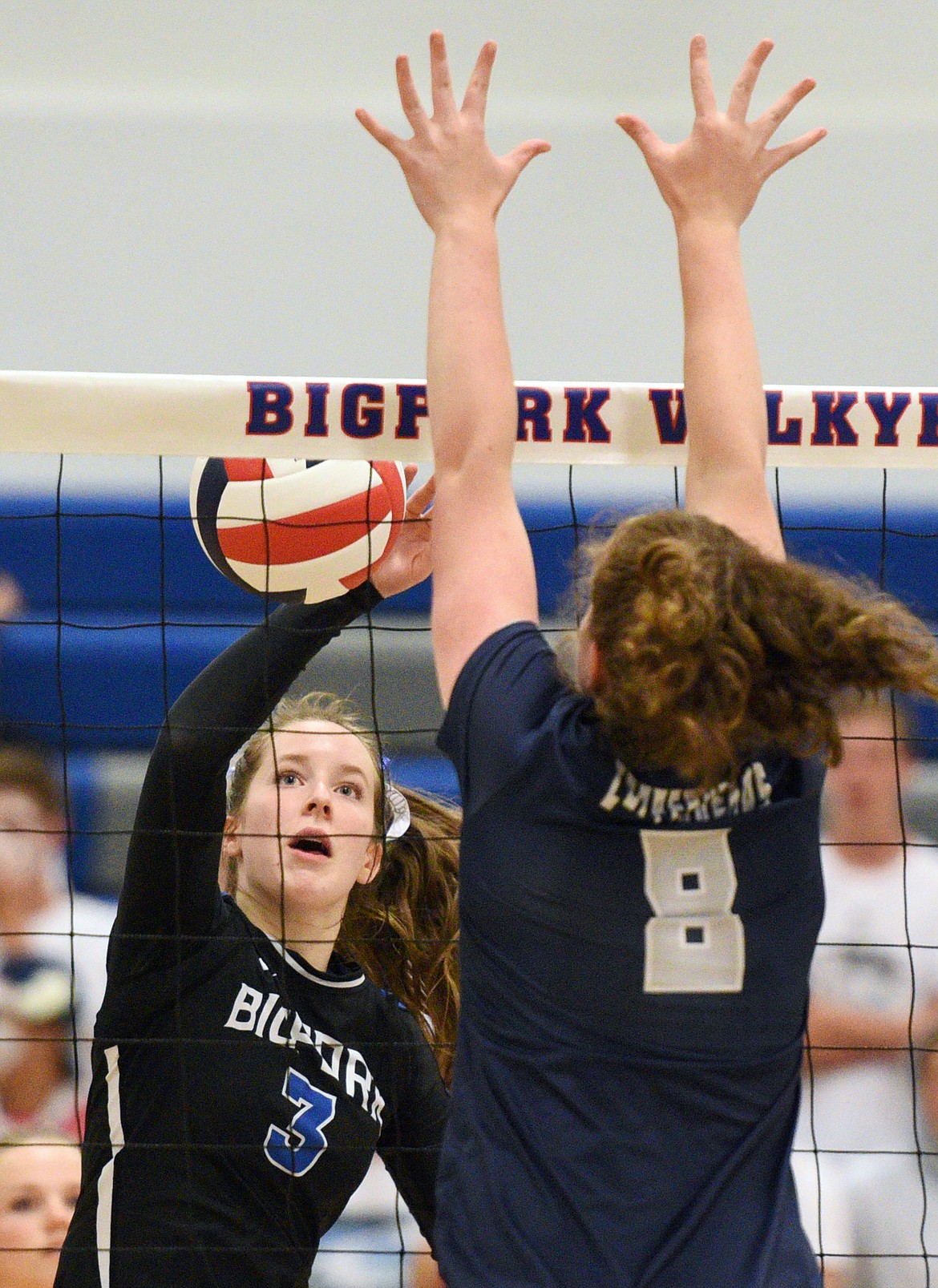 Bigfork's Juniper Johnson (3) looks to hit around the defense of Anaconda's Isabel Saltenberger (8) at Bigfork High School on Thursday. (Casey Kreider/Daily Inter Lake)