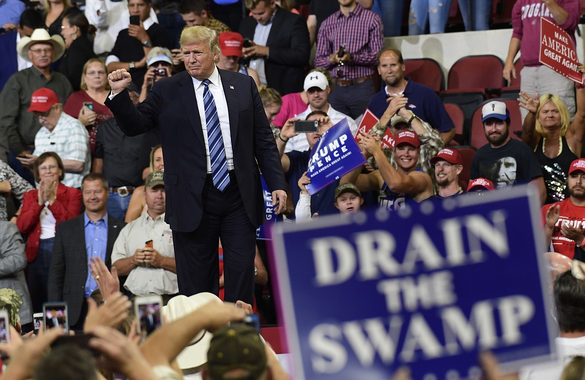 President Donald Trump gestures to the crowd as he finishes his speech at a rally in Billings, Mont., Thursday, Sept. 6, 2018.(AP Photo/Susan Walsh)