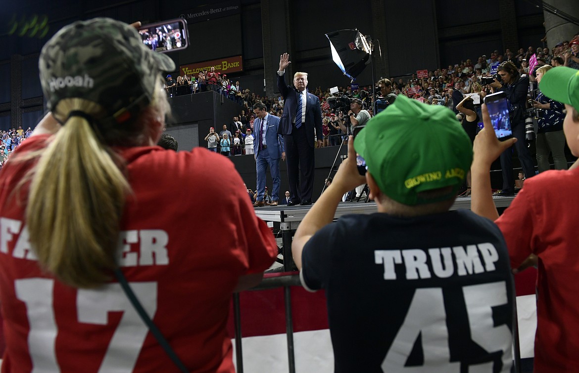 President Donald Trump waves to the crowd after doing a television interview before the start of a rally in Billings, Mont., Thursday, Sept. 6, 2018.(AP Photo/Susan Walsh)