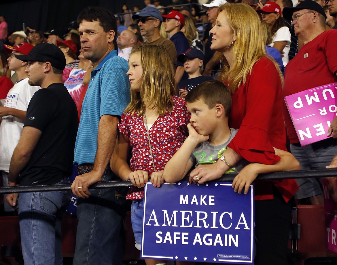 Supporters of President Donald Trump wait for him to speak at rally at the Rimrock Auto Arena in Billings, Mont., Thursday, Sept. 6, 2018. (AP Photo/Jim Urquhart)