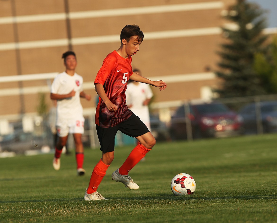 Post Falls midfielder Caleb Calkins dribbles the ball in open space during Tuesday&#146;s match against Sandpoint.