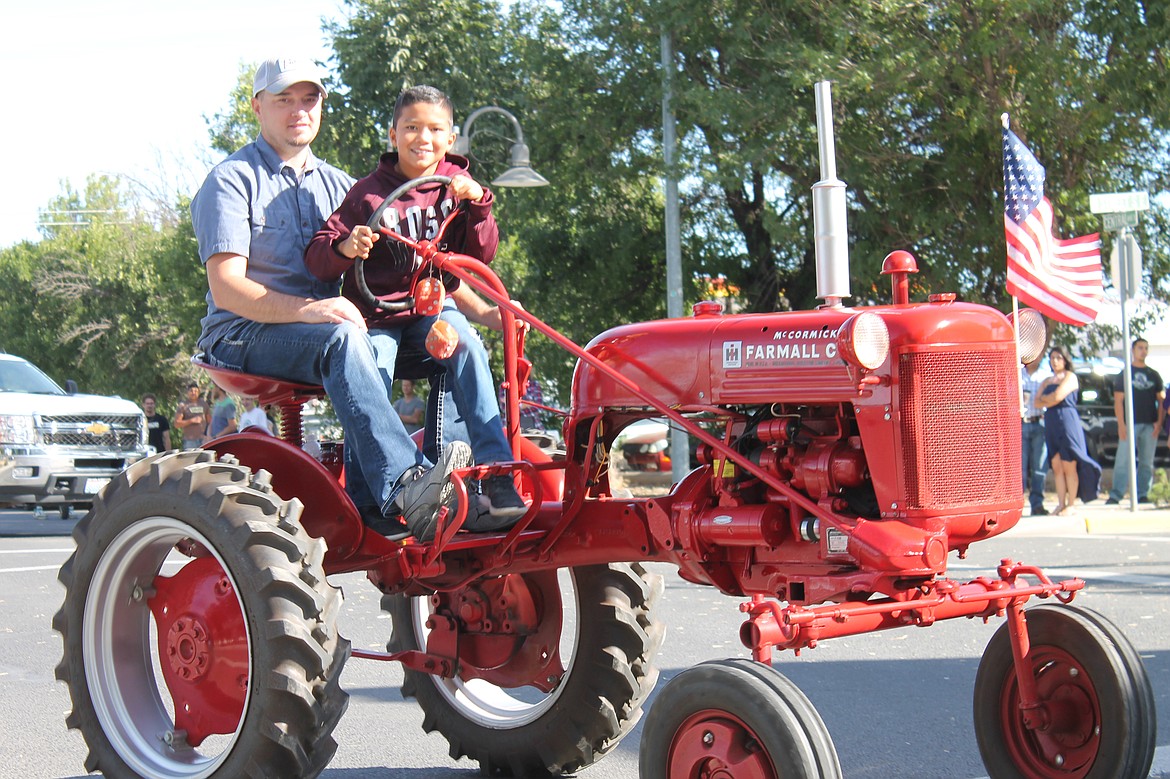 Emry Dinman/Columbia Basin Herald
Antique tractors made up their own section of the Grand Parade, showcasing farm equipment of the past.