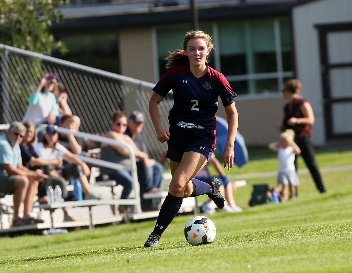 Coeur d&#146;Alene Charter 
midfielder 
Ava Shivers 
dribbles the ball downfield in a match against 
St. Maries on Wednesday afternoon at North Idaho College.
