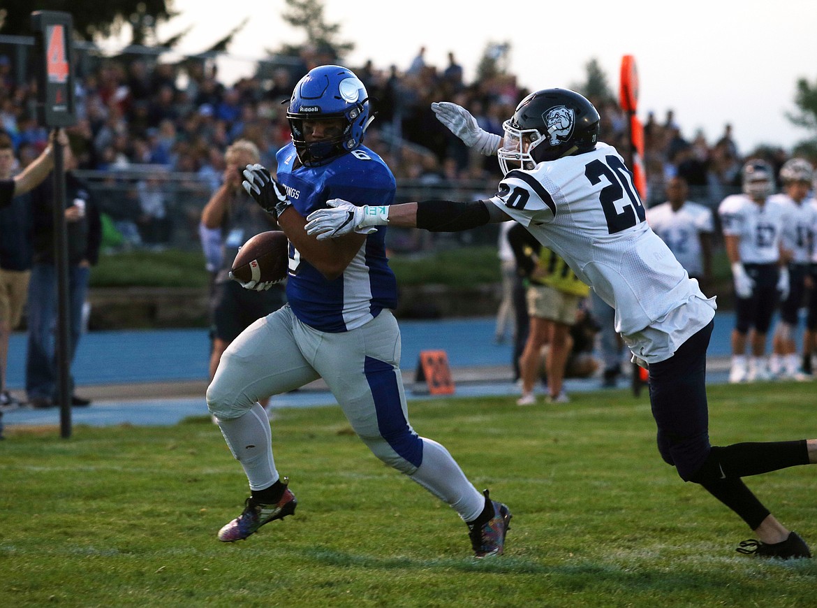 Coeur d&#146;Alene running back Shilo Morgan rushes across the goal line for a score in the first quarter against Gonzaga Prep.