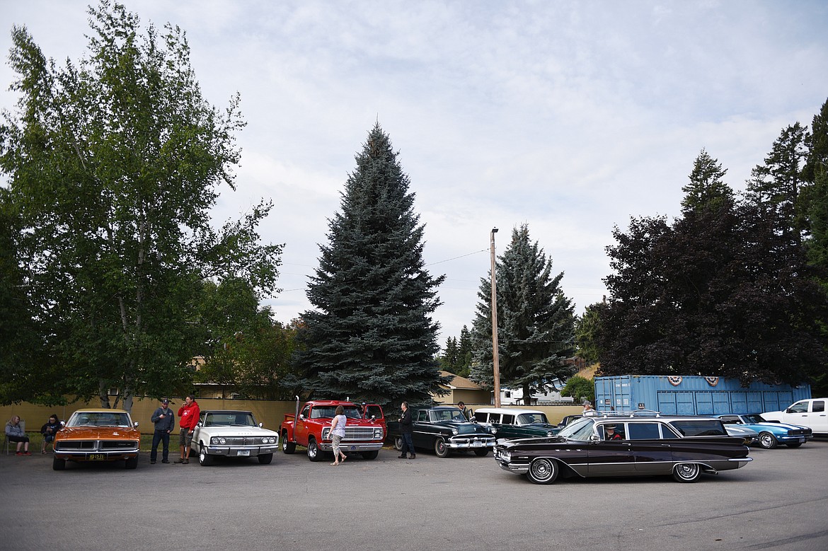 Classic cars line up outside VFW Post 4042 in Bigfork before the poker run around Flathead Lake for the 11th annual Rumble in the Bay car, truck and motorcycle show on Saturday morning. (Casey Kreider/Daily Inter Lake)