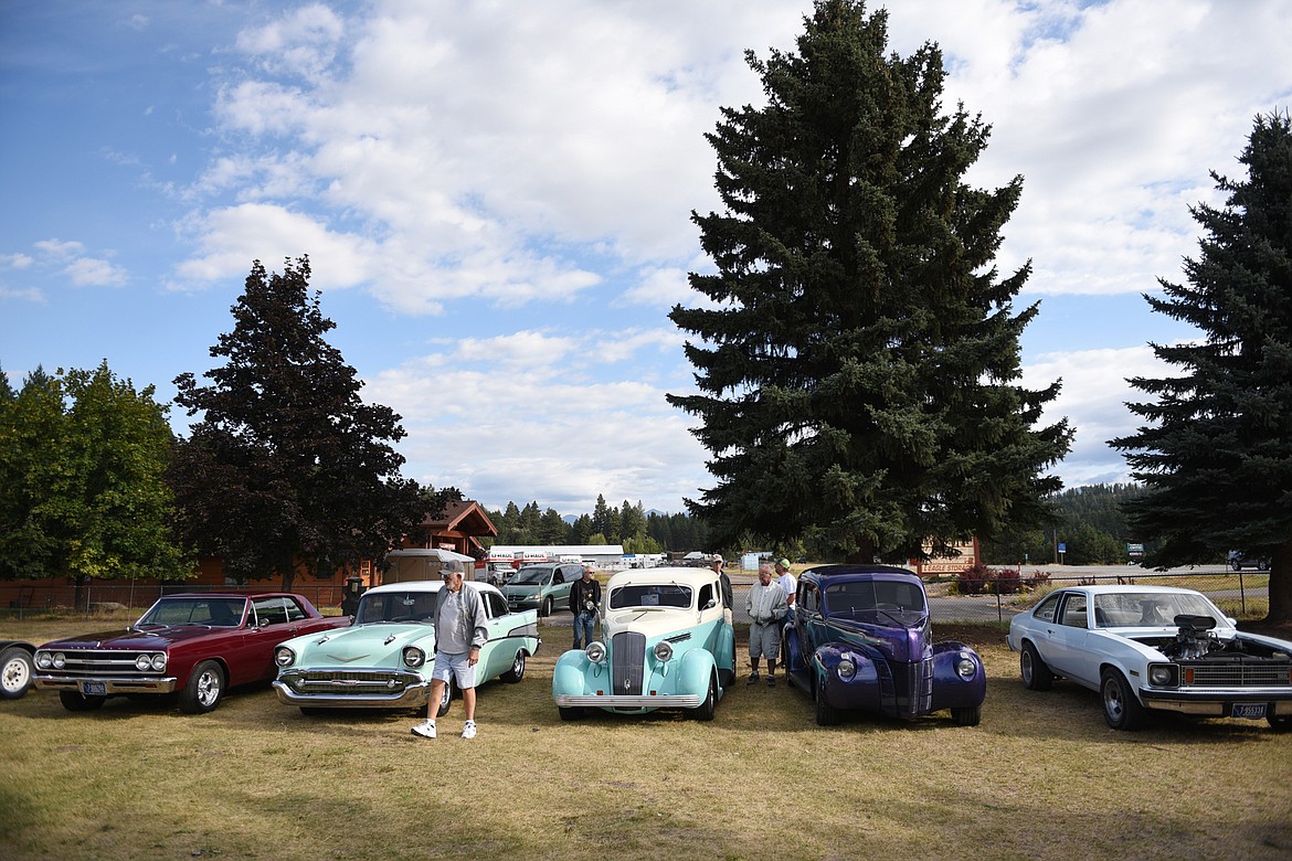 Classic cars line up outside VFW Post 4042 in Bigfork before the poker run around Flathead Lake for the 11th annual Rumble in the Bay car, truck and motorcycle show on Saturday morning. (Casey Kreider/Daily Inter Lake)