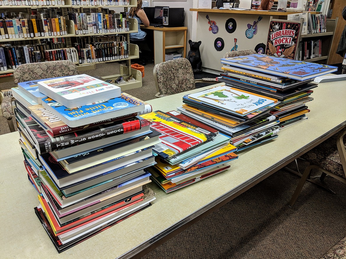 The 94 children’s books that were acquired with grant funding for the Osburn Public Library.
Photo by
CHANSE WATSON
