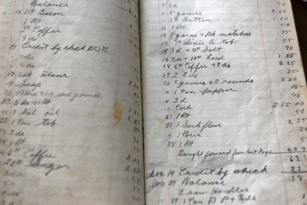 An &#147;order book&#148; detailing customers&#146; purchases at Polebridge Mercantile dating back to between 1904-1907 at Lois Walker&#146;s residence in Polebridge on Friday, Aug. 10. (Casey Kreider/Daily Inter Lake)