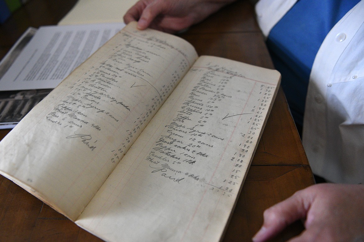 An &#147;order book&#148; detailing customers&#146; purchases at Polebridge Mercantile dating back to between 1904-1907 at Lois Walker&#146;s residence in Polebridge on Friday, Aug. 10. (Casey Kreider/Daily Inter Lake)