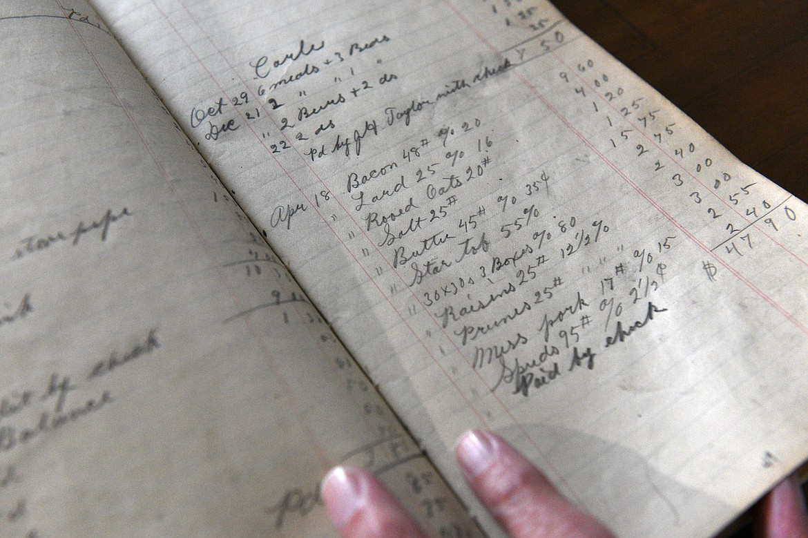 An &#147;order book&#148; detailing customers&#146; purchases at Polebridge Mercantile dating back to between 1904-1907 at Lois Walker&#146;s residence in Polebridge on Friday, Aug. 10. (Casey Kreider/Daily Inter Lake)