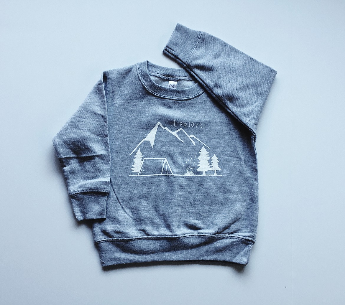 This shirt designed and sold by Kevin John suggests the outdoors are waiting to be explored.