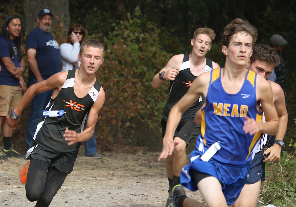 (Photo by MARY MALONE)
Spartan freshmen Brian Lord, left, and Kayden Fulton turned in strong times on Saturday in Hayden.