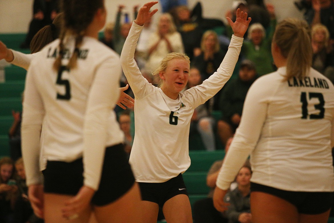 Lakeland&#146;s Addisen Kiefer celebrates a block in Thursday night&#146;s match against Sandpoint at Lakeland High School. (LOREN BENOIT/Press)