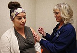 Getting a shot ... and a jump on flu season