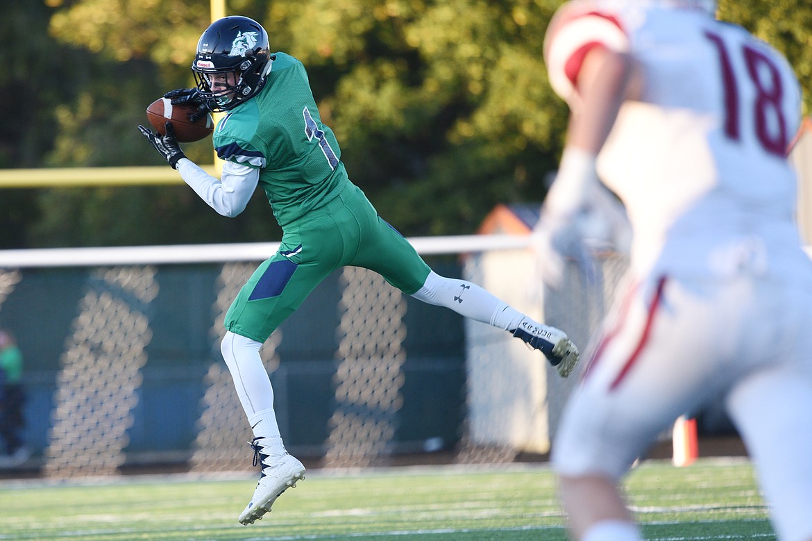 Glacier wide receiver Colin Bowden (1) hauls in a first quarter reception against Helena at Legends Stadium on Friday. (Casey Kreider/Daily Inter Lake)