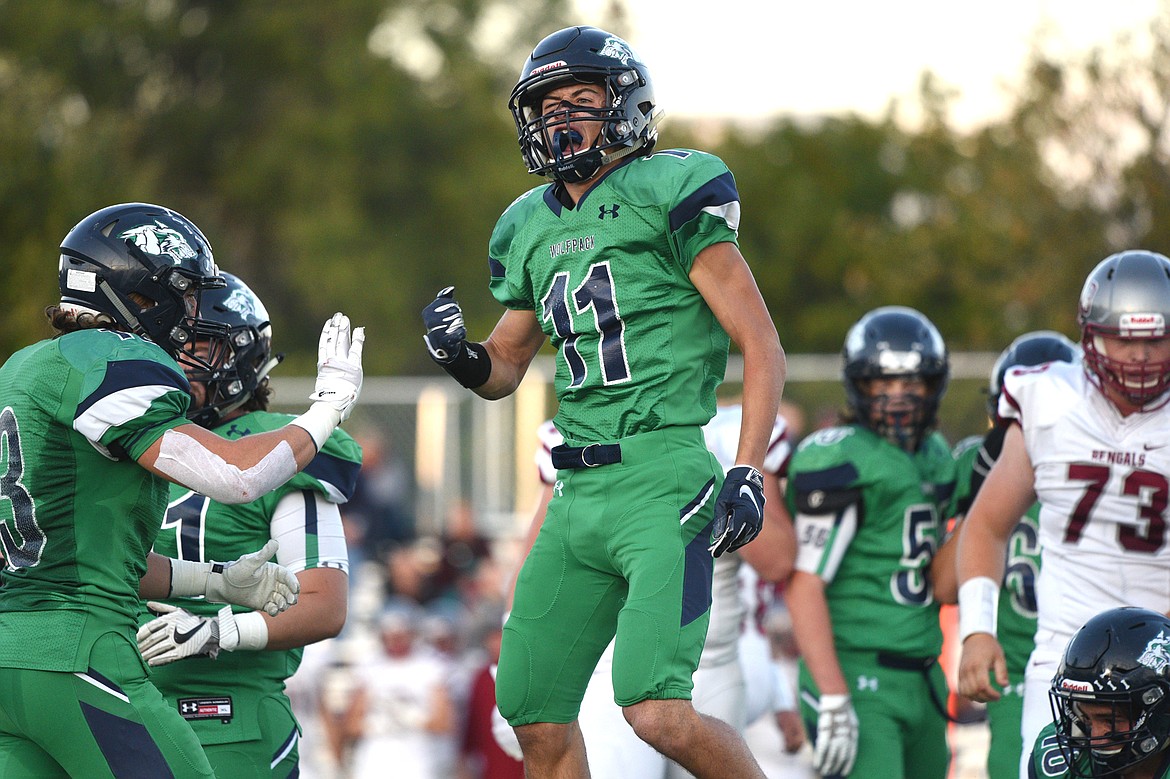 Glacier defensive back Gator Mostek (11) celebrates after a fourth down stop of Helena quarterback Ty McGurran in the second quarter at Legends Stadium on Friday. (Casey Kreider/Daily Inter Lake)