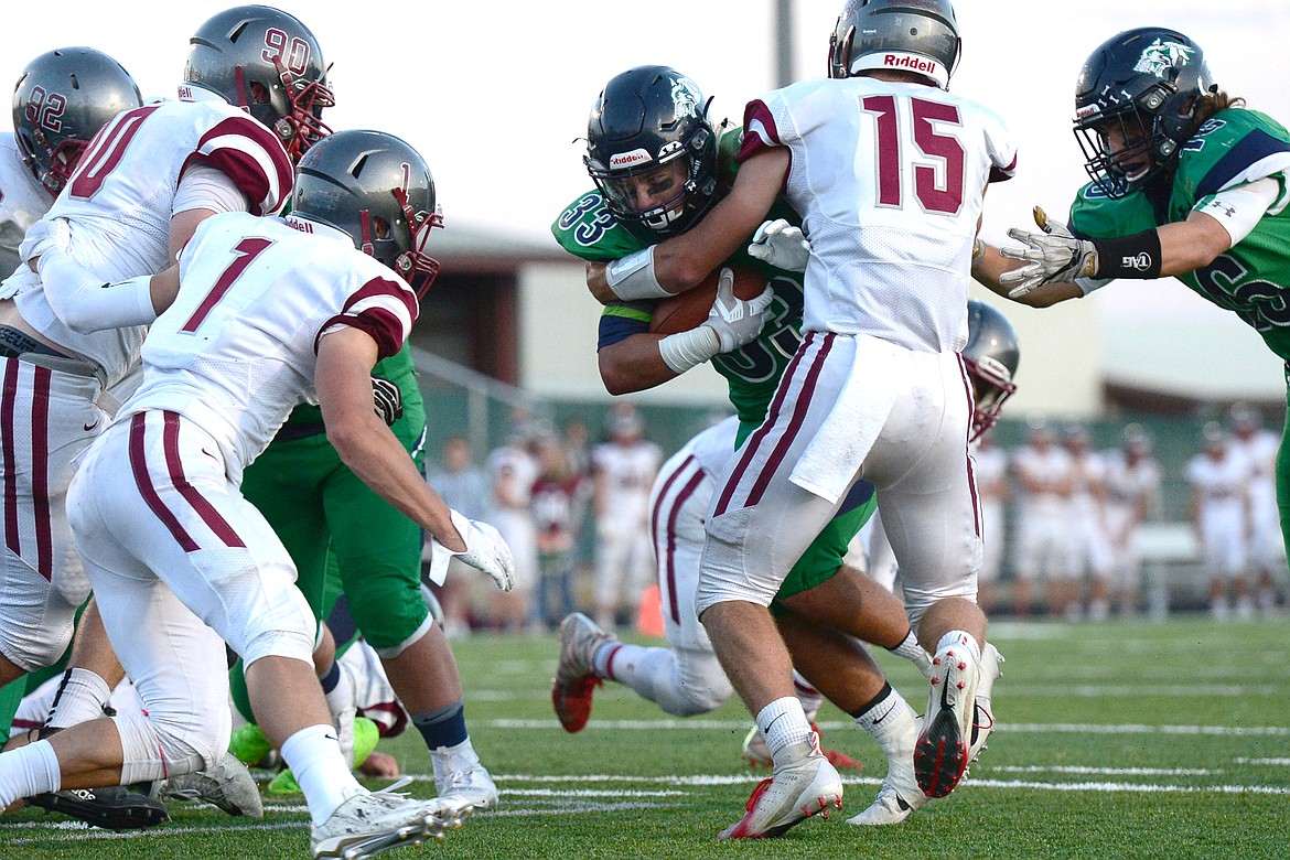 Glacier running back Preston Blain (33) powers into the end zone for the Wolfpack&#146;s second touchdown on the day against Helena at Legends Stadium on Friday. (Casey Kreider/Daily Inter Lake)