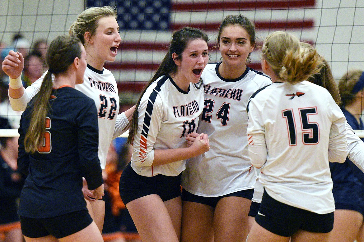 Flathead celebrates a point in the second match against Glacier during crosstown volleyball at Flathead High School on Thursday. (Casey Kreider/Daily Inter Lake)